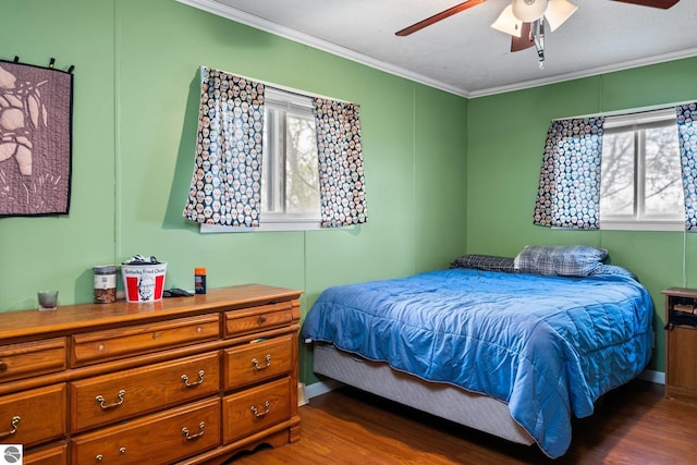 8817 Wilson Rd, Buckley, MI 49620 - bedroom with crown molding, wood finished floors, multiple windows, and ceiling fan