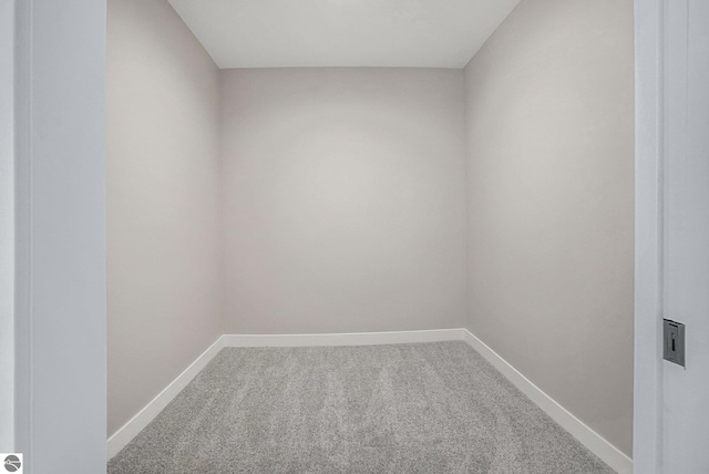 5203 NE Myers Rd, Kalkaska, MI 49646 - unfurnished room featuring carpet and baseboards