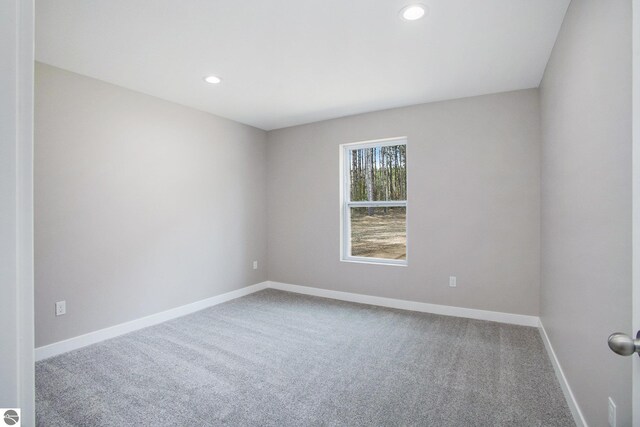 5203 NE Myers Rd, Kalkaska, MI 49646 - carpeted spare room with baseboards and recessed lighting