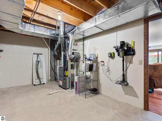 6307 Summit Ct, Traverse City, MI 49686 - below grade area featuring heating unit
