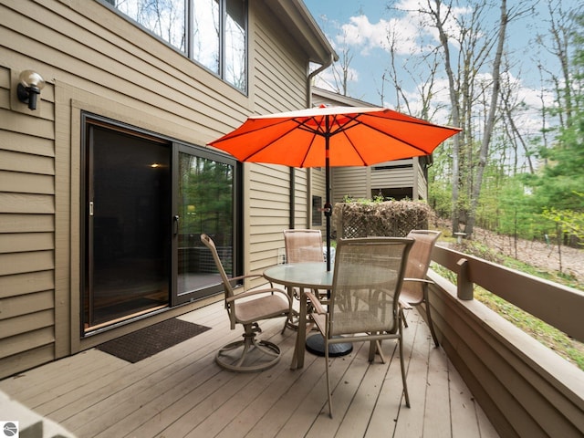 6307 Summit Ct, Traverse City, MI 49686 - deck featuring outdoor dining space