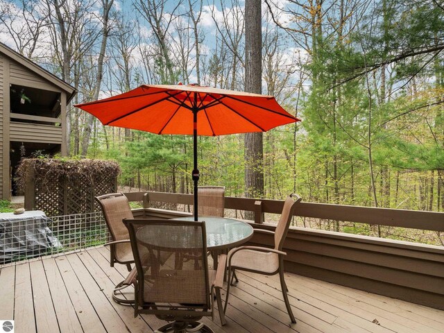 6307 Summit Ct, Traverse City, MI 49686 - wooden terrace featuring outdoor dining space