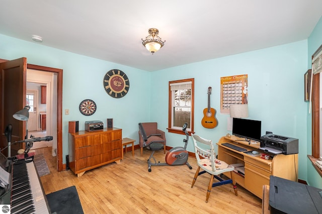618 E Illinois St, Mount Pleasant, MI 48858 - office area featuring light wood-type flooring, plenty of natural light, and baseboards