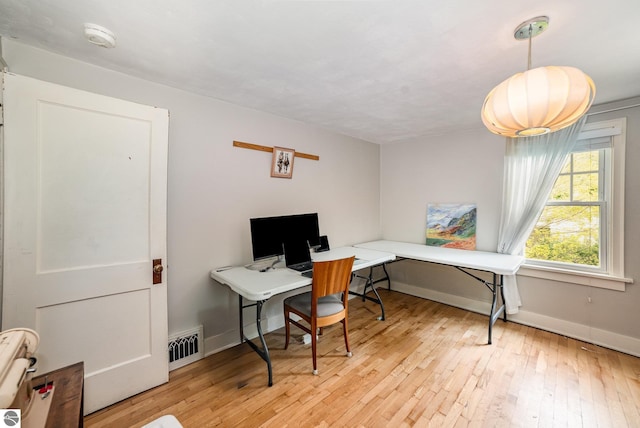 618 E Illinois St, Mount Pleasant, MI 48858 - office space with hardwood / wood-style flooring and baseboards
