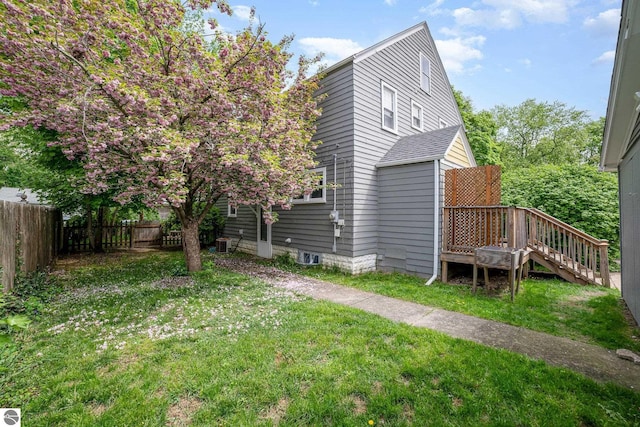 618 E Illinois St, Mount Pleasant, MI 48858 - view of yard featuring a deck, cooling unit, and stairs
