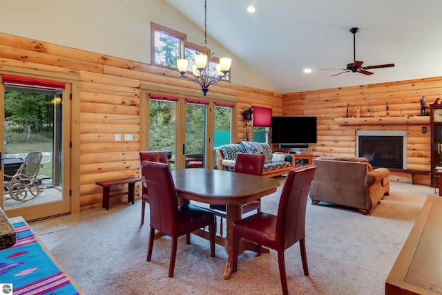 dining room featuring high vaulted ceiling, log walls, a chandelier, plenty of natural light, and recessed lighting