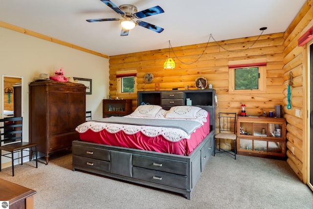 bedroom featuring rustic walls and carpet floors