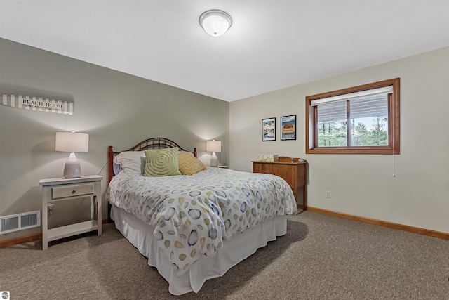 224 Island View Dr, Traverse City, MI 49696 - carpeted bedroom with baseboards