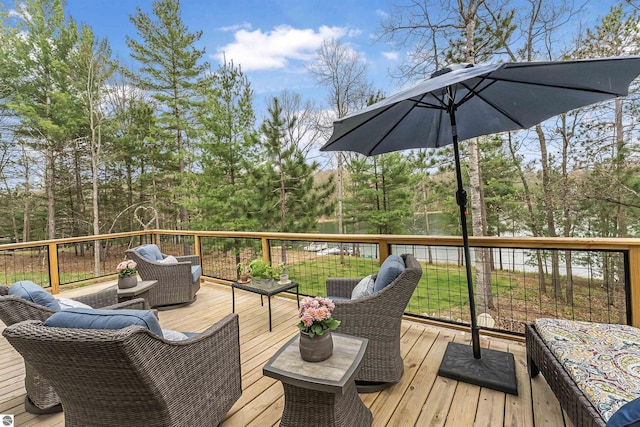 224 Island View Dr, Traverse City, MI 49696 - wooden terrace featuring outdoor lounge area