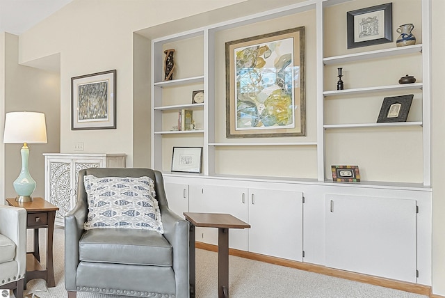 224 Island View Dr, Traverse City, MI 49696 - sitting room with carpet and built in shelves