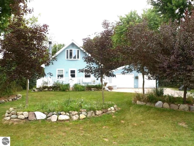 1117 Lincoln Dr, Lake Isabella, MI 48893 - back of property featuring a yard