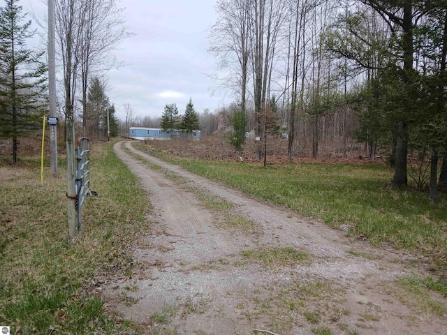 1392 Kitchen Rd, Whittemore, MI 48770 - view of dirt / gravel road
