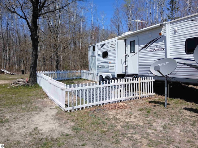 1392 Kitchen Rd, Whittemore, MI 48770 - view of front facade with fence