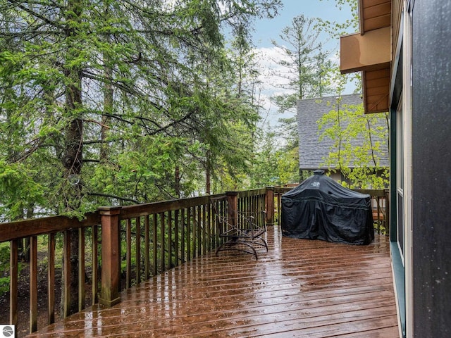 5467 Lakeview Dr, Interlochen, MI 49643 - wooden deck featuring grilling area