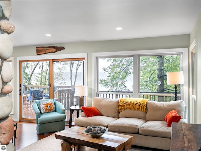 5467 Lakeview Dr, Interlochen, MI 49643 - living room with healthy amount of natural light, wood finished floors, and recessed lighting