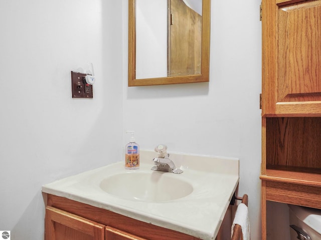 11401 Orchard Dr, Rapid City, MI 48622 - bathroom featuring vanity