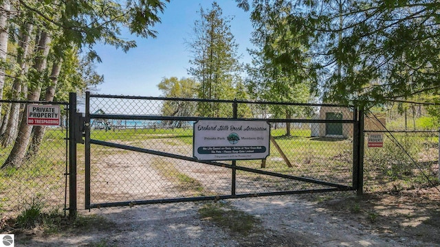 11401 Orchard Dr, Rapid City, MI 48622 - gate featuring fence