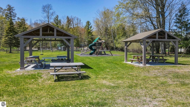 11401 Orchard Dr, Rapid City, MI 48622 - view of community with a gazebo and a lawn