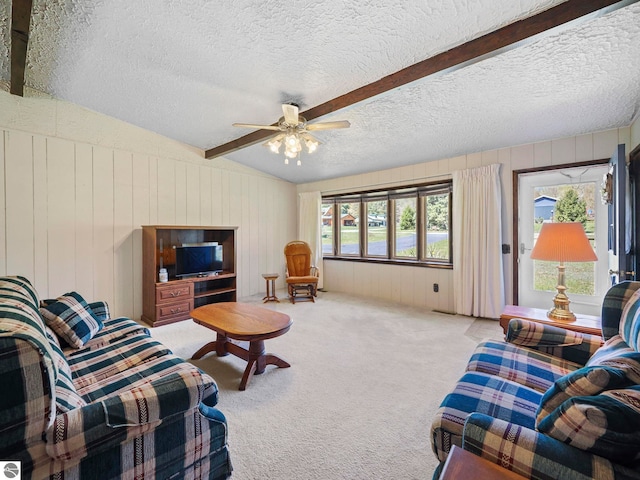11401 Orchard Dr, Rapid City, MI 48622 - carpeted living area with a textured ceiling and ceiling fan