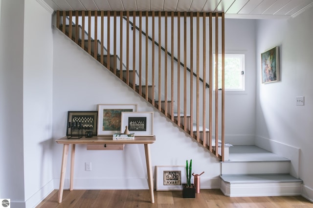 1435 S French Rd, Lake Leelanau, MI 49653 - stairs featuring wood finished floors and baseboards
