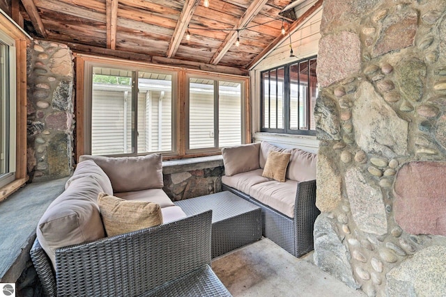 sunroom with lofted ceiling