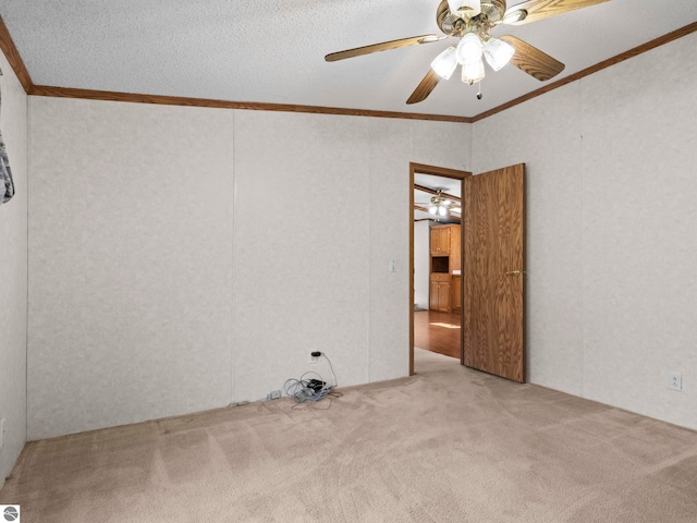 5891 N 19th Rd, Mesick, MI 49668 - unfurnished room featuring carpet flooring, ornamental molding, ceiling fan, and lofted ceiling