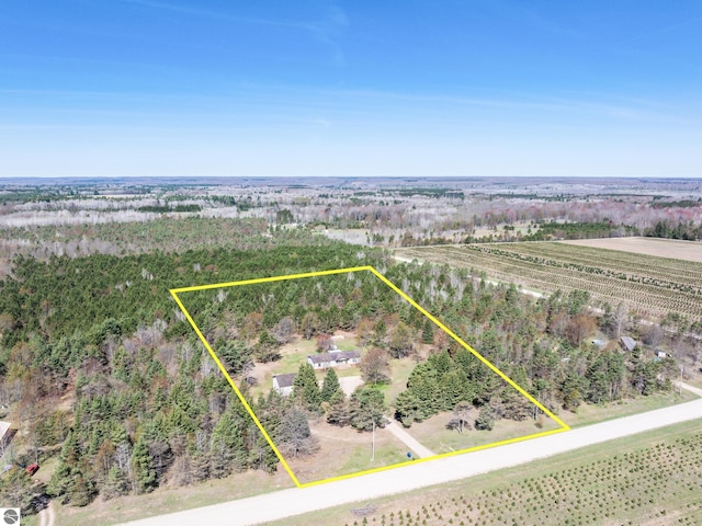 5891 N 19th Rd, Mesick, MI 49668 - overview of rural landscape featuring property parcel outlined and farmland