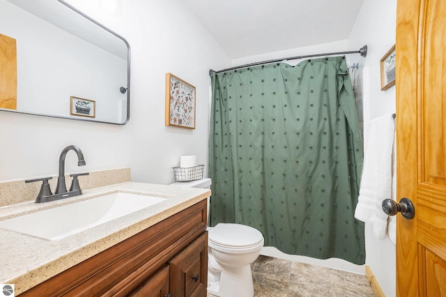 9266 Kenyon Trl, Frederic, MI 49733 - bathroom featuring vanity, toilet, and a shower with curtain