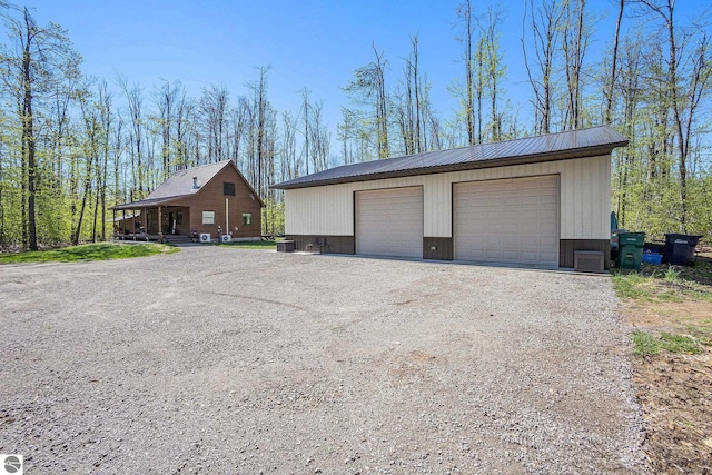 9266 Kenyon Trl, Frederic, MI 49733 - detached garage with cooling unit