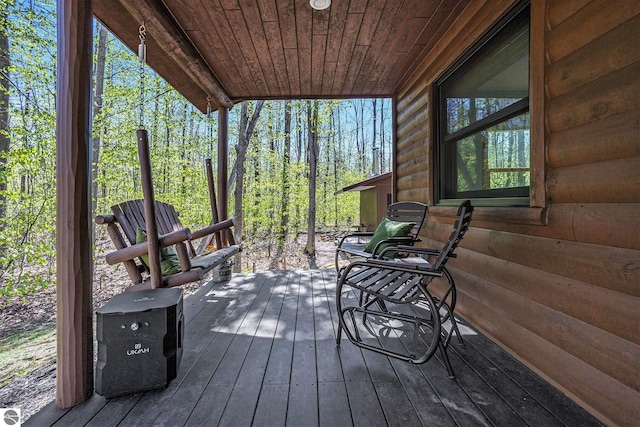 9266 Kenyon Trl, Frederic, MI 49733 - view of wooden deck