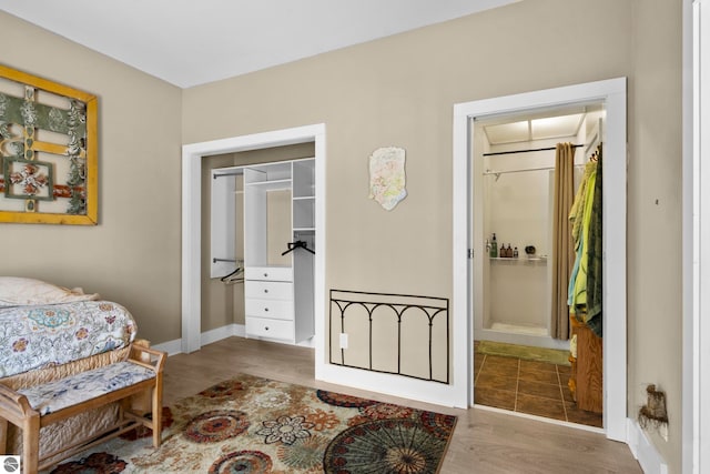 203 W 2nd St, Elk Rapids, MI 49629 - living area with wood finished floors and baseboards