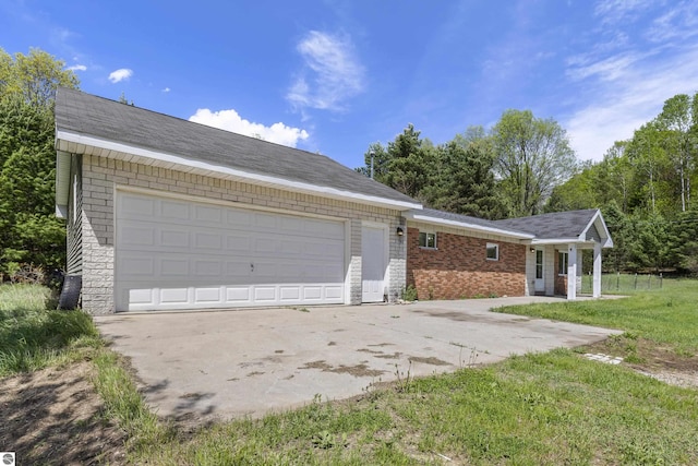 view of front of home with brick siding and a front yard