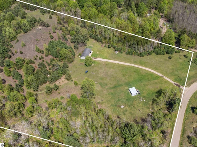 aerial view of sparsely populated area featuring property boundaries highlighted