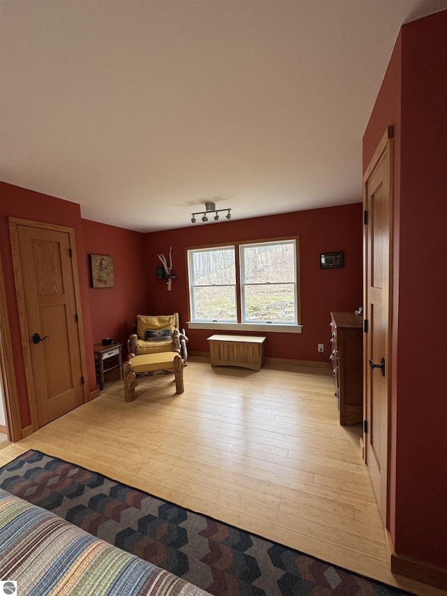 sitting room with light wood finished floors