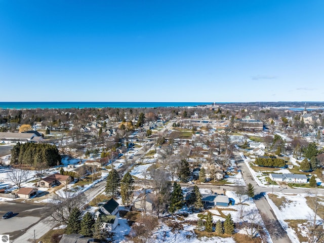 aerial view of property and surrounding area with nearby suburban area