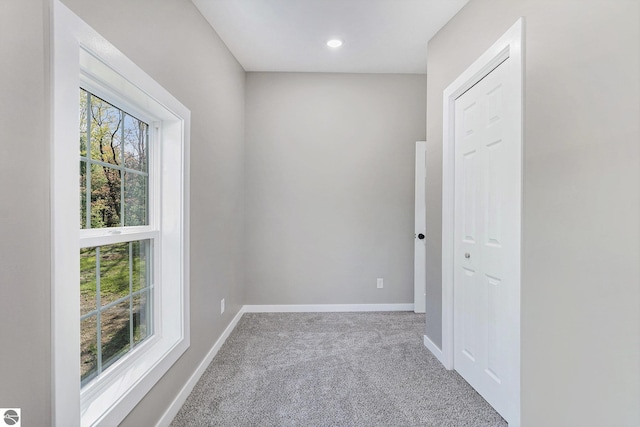 3218 S 41st Rd, Cadillac, MI 49601 - carpeted empty room featuring baseboards and recessed lighting