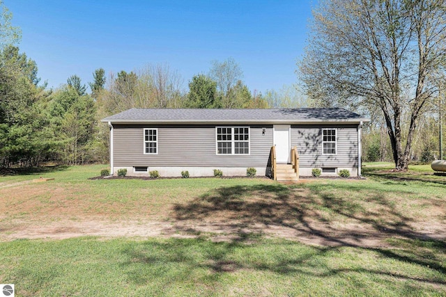3218 S 41st Rd, Cadillac, MI 49601 - view of front facade with a front lawn