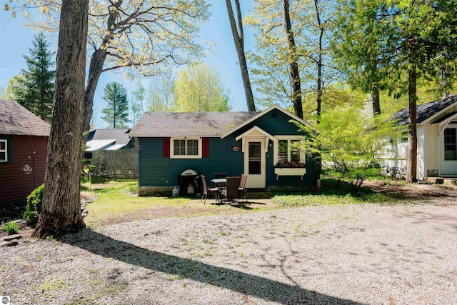 429 S Shabwasung St, Northport, MI 49670 - back of property with a shingled roof