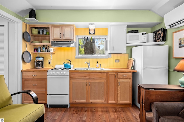 429 S Shabwasung St, Northport, MI 49670 - kitchen with white appliances, a sink, a wall mounted air conditioner, under cabinet range hood, and open shelves