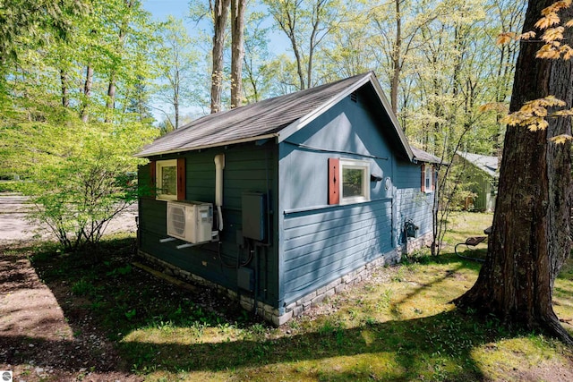 429 S Shabwasung St, Northport, MI 49670 - view of outdoor structure featuring ac unit and an outbuilding