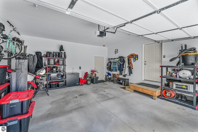 garage featuring a garage door opener