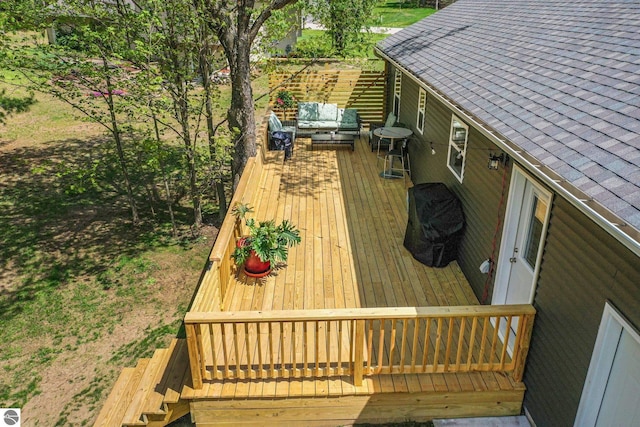 deck with an outdoor living space