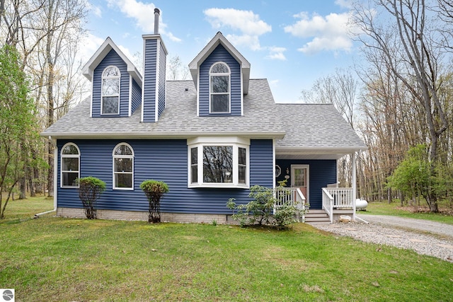 4480 Mockingbird Cir, Farwell, MI 48622 - view of front facade with covered porch, a shingled roof, a front lawn, and a chimney