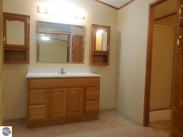 5232 E Broadway Lot 338, Mount Pleasant, MI 48858 - bathroom featuring a shower stall, crown molding, and vanity