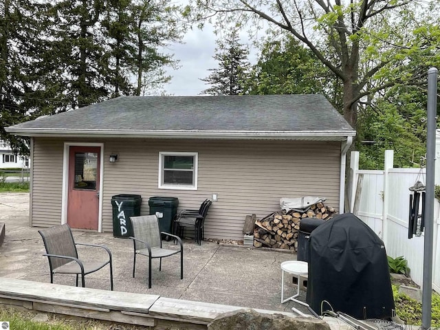630 N State St, Alma, MI 48801 - view of patio with area for grilling and fence