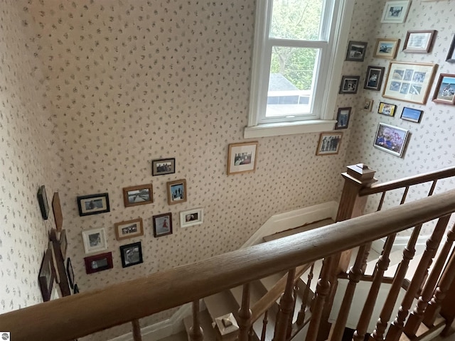 630 N State St, Alma, MI 48801 - staircase with wallpapered walls