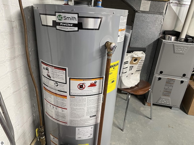 630 N State St, Alma, MI 48801 - utility room with gas water heater