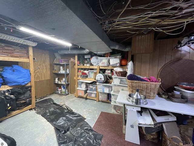 630 N State St, Alma, MI 48801 - unfinished basement featuring wooden walls