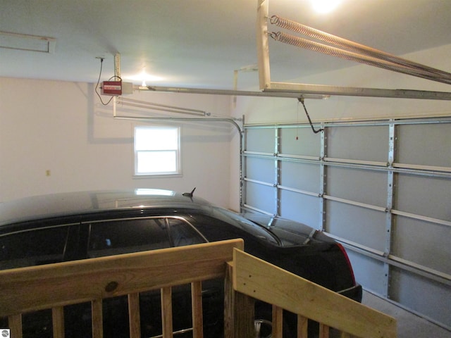 8481 N Luce Rd, Alma, MI 48801 - garage with a garage door opener
