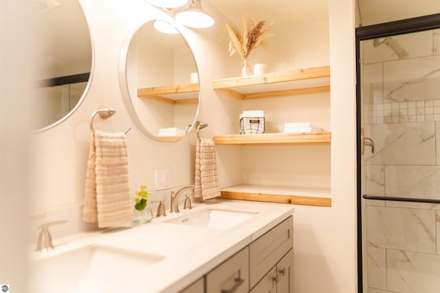 968 Barlow St, Traverse City, MI 49686 - full bath with a marble finish shower and double vanity